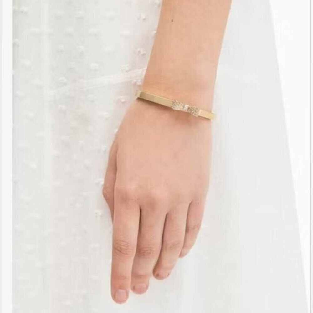 Kate Spade New York Gold-Tone Bow Bangle Bracelet with Crystals + Pouch